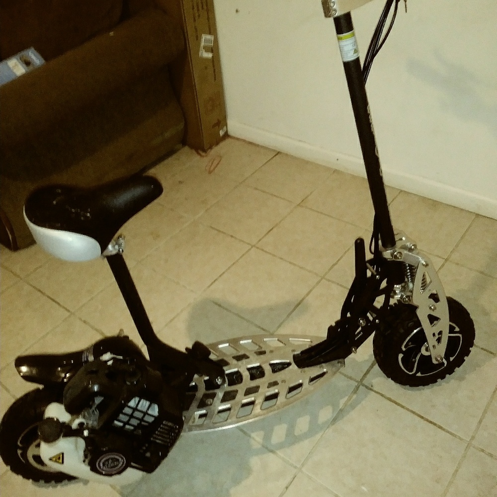 A waxing gas UBER scooter.never used.just don't ha